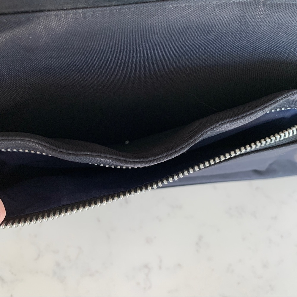 Black Travel Bag with Structured Design and Metal Feet - Picture 3 of 16